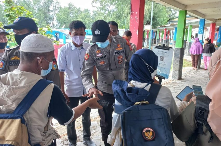  Pospam Ops Lilin Jaya-2021 Pulau Tidung Kep Seribu Selatan Terus Perketat Aturan ProKes di Dermaga Pelabuhan